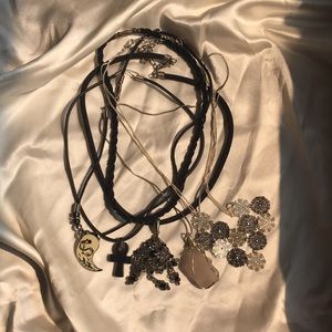 6 black and silver necklaces